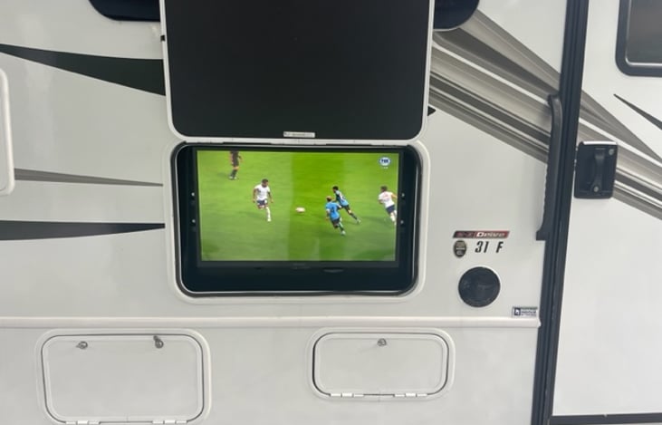 Exterior TV makes it nice sitting outside with a group.