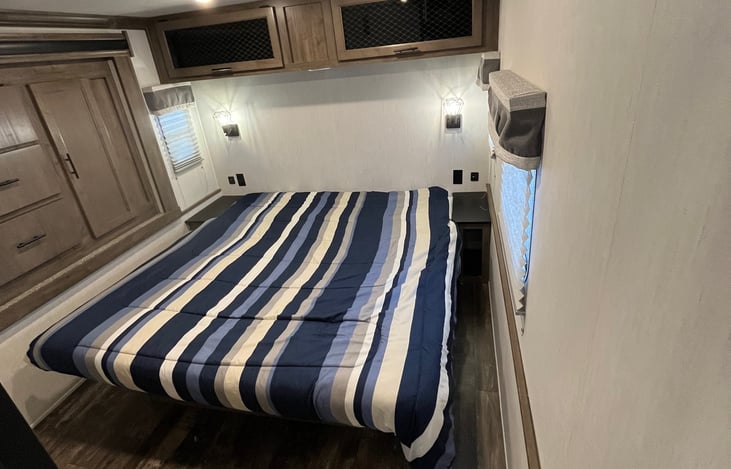 king bed with overhead storage