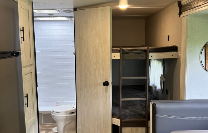 Bathroom beside bunks