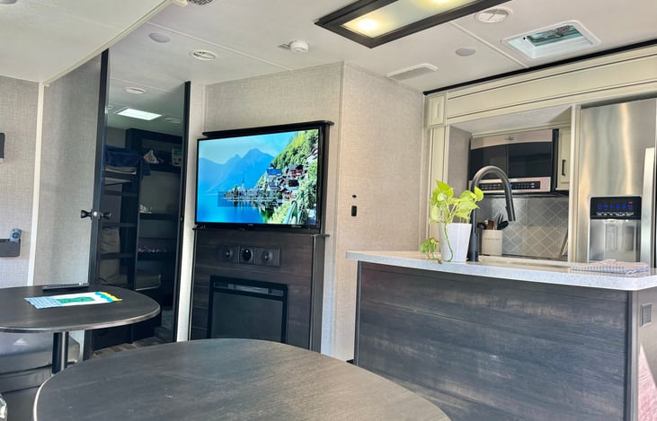 50” TV and fireplace!