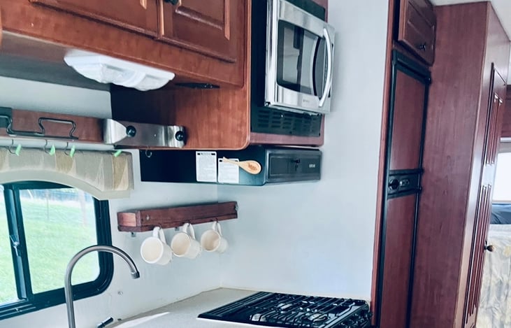 Stove, oven, microwave and  refrigerator