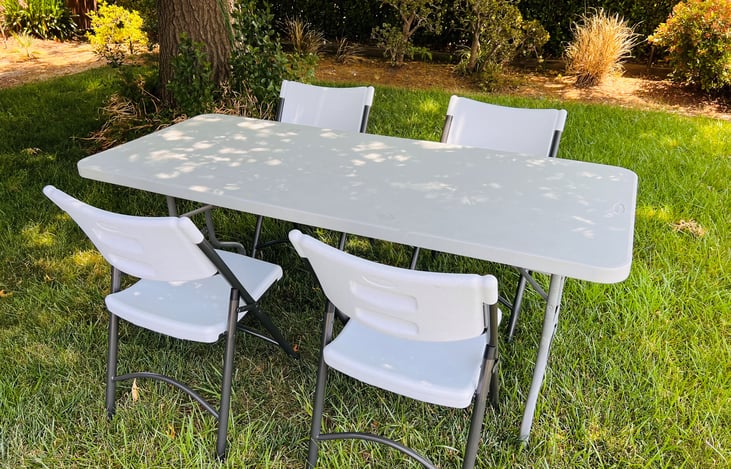 4 plastic folding chairs and 6ft table for rent.