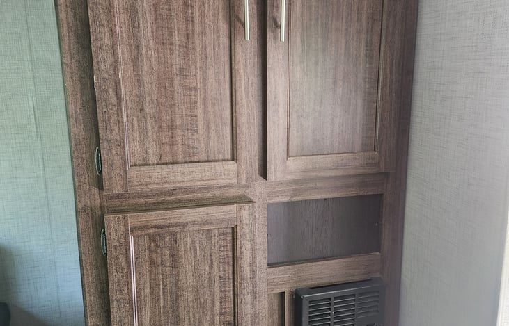 Cabinets next to dinette for storage.