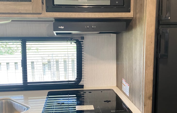 Three burner stove with oven.