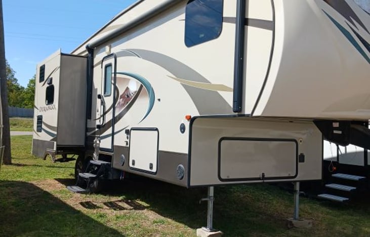 Durango 1500 Series, passenger side slide out, kitchen. Door with Screen door.