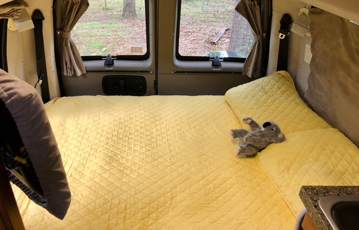 Motorized reclining sofa becomes a full-size rear bed.