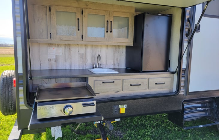 So convenient to be able to keep all most all the cooking outside and have the refrigerator as well!
