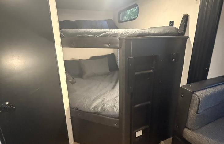 Full size bunks with pull out ladder