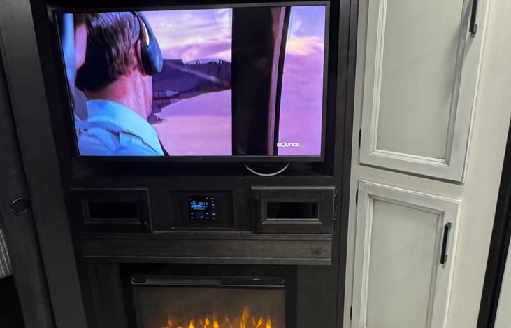 Tv and fireplace