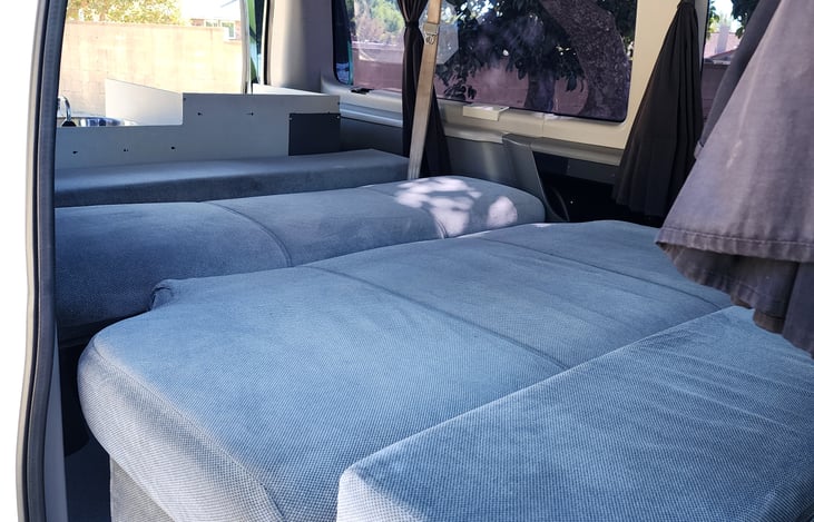 Couch folds out to Queen Bed