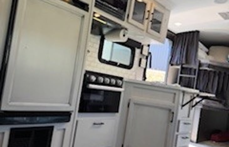 Well equipped Kitchen with Stove Oven Sink Microwave