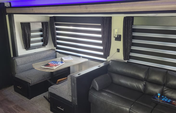 Kitchen table and sofa in extra-deep slideout.