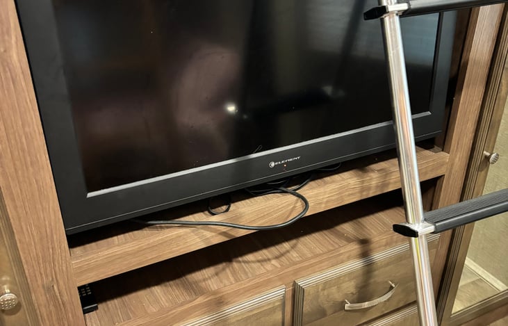 Tv and storage under left hand bunk