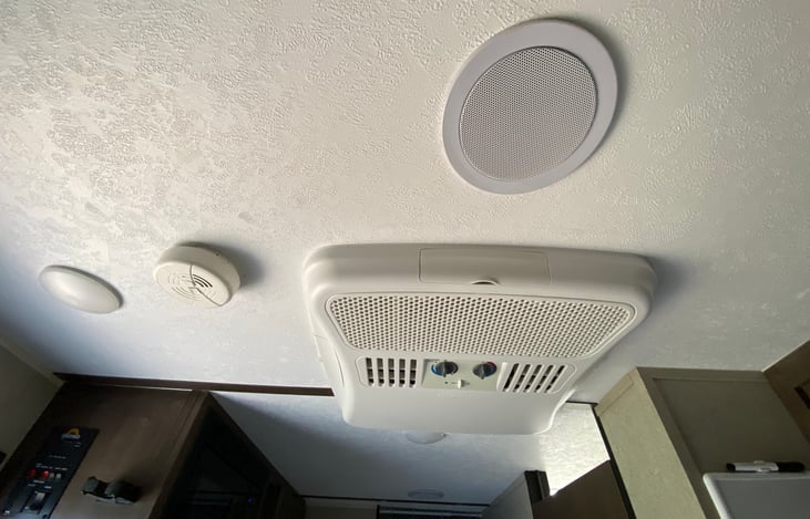 Ceiling area: above lights, fire alarm, AC/Heater unit, speakers