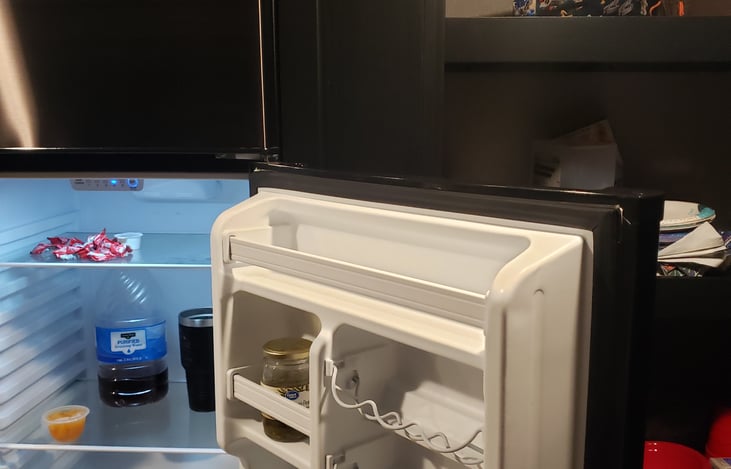 Spacious fridge and cabinet space.