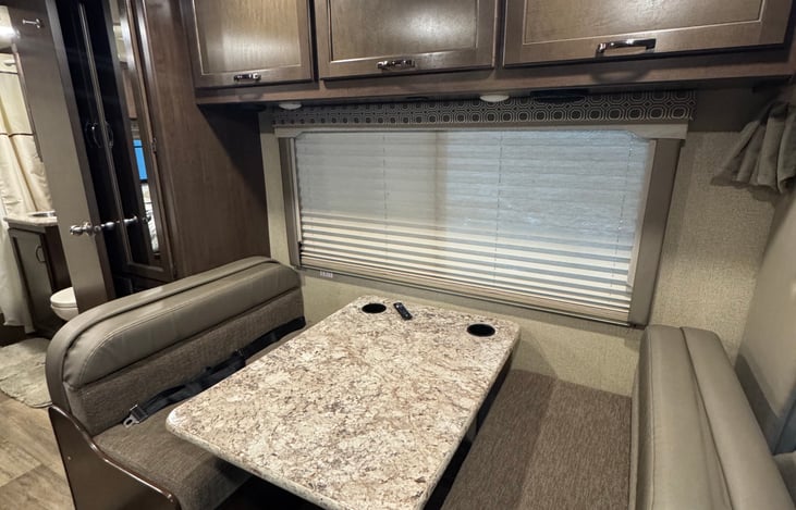 Dining area during the day and can be utilized as a sleeping area.