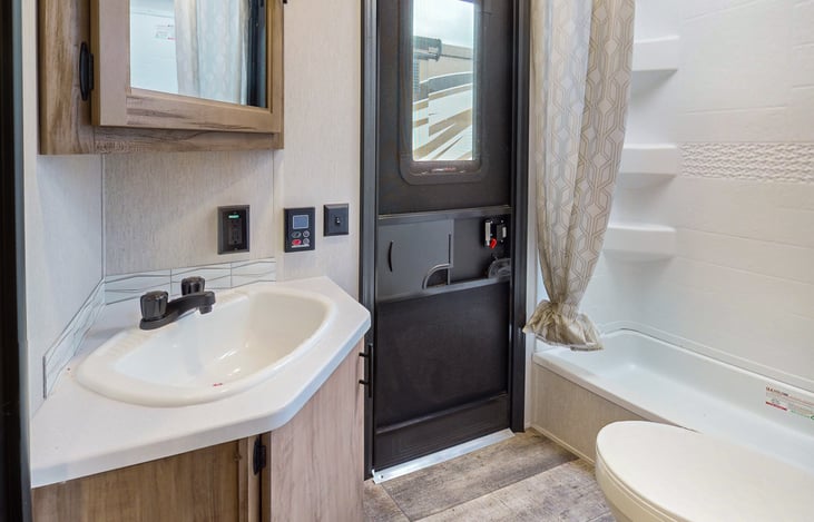 Not only does a skylight situated in the shower give you some natural light, but it adds a few inches to give you the ability to have a relaxing shower.