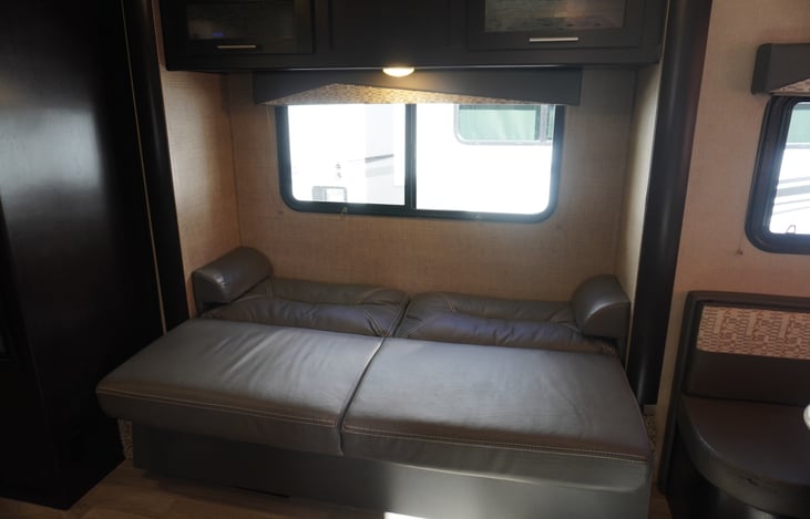 Couch converted to bed.