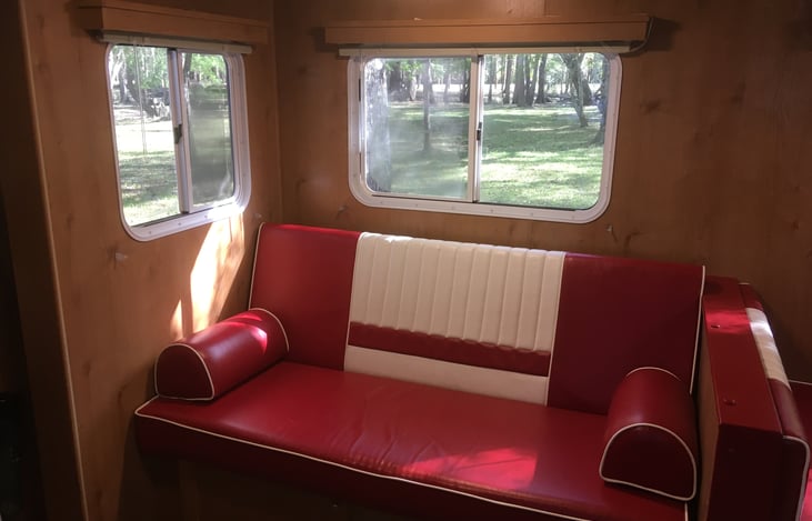 Love seat ... Watch TV or the fireplace ... Or gaze out the windows