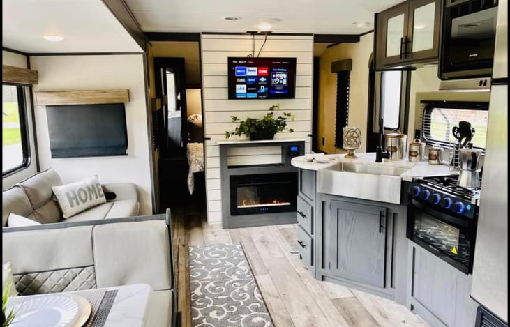 Farmhouse looks inside. Comes with a working heating fireplace and a smart TV that you can sign in with your hot-spot.