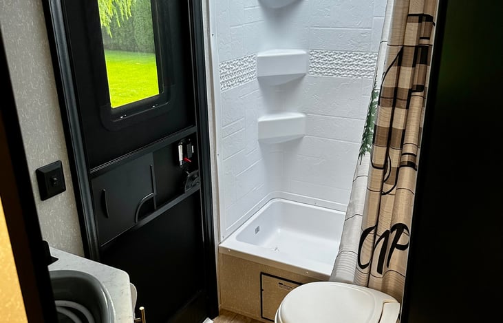 Full bathroom with shower and tub