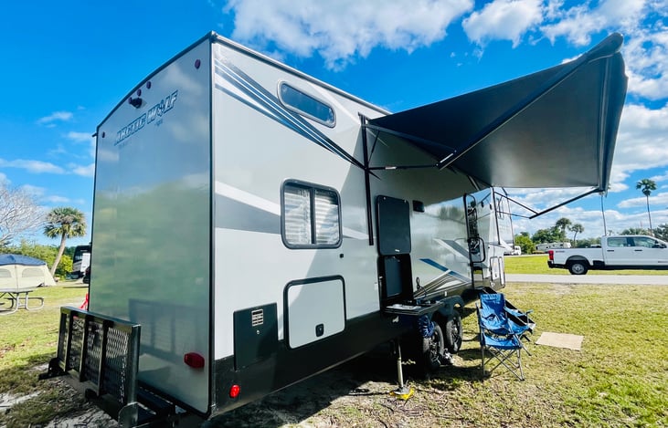 Oversized 20’ exterior awning with deluxe outside kitchen for the camp chef.