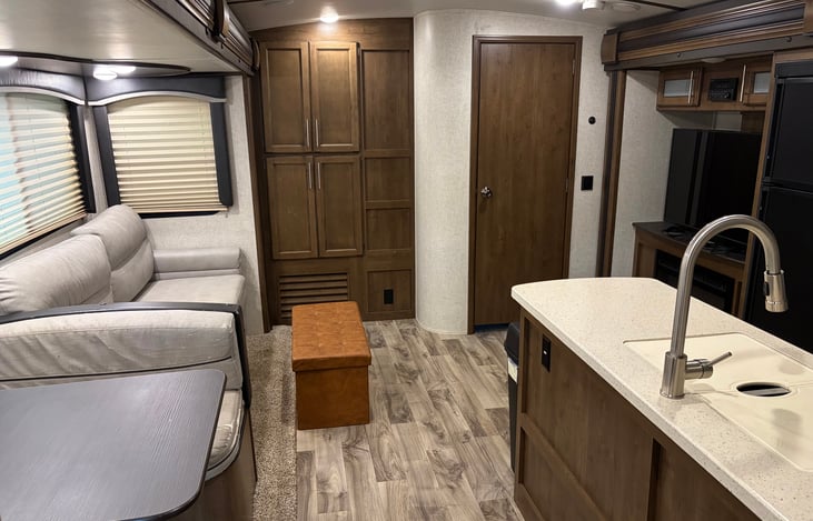 Living room with tv and fireplace