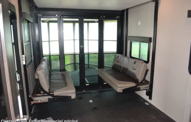 Garage
Happy Jack Bunks - Bottom can sleep 2 & top can sleep 2.
Bottom bunk turns into seating area with table insert in between.