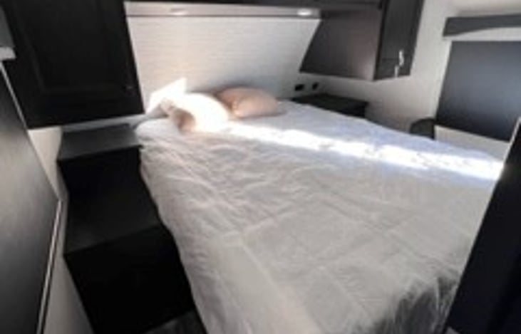 Bedroom - Queen size bed with closet and extra storage space