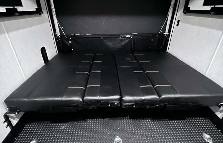 Queen bed turns into bench seats