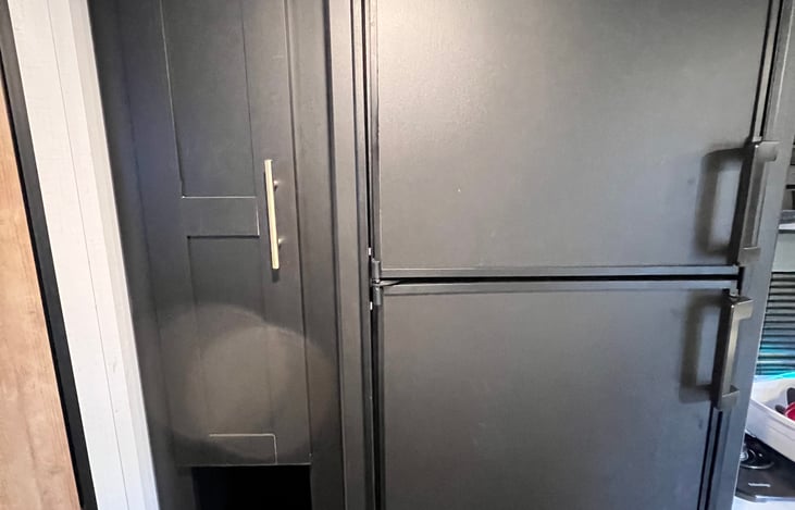 Dual fuel fridge and freezer.  Will be nice and cold for you for your trip!