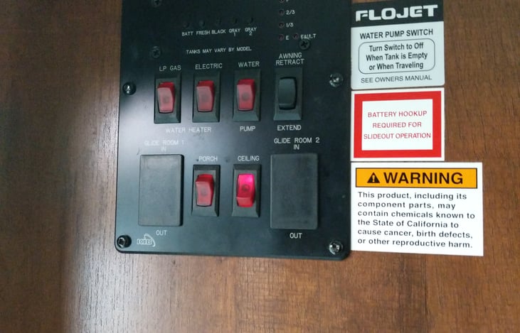 Water heater controls, Awning control, Ceiling lights, and how to check water levels.