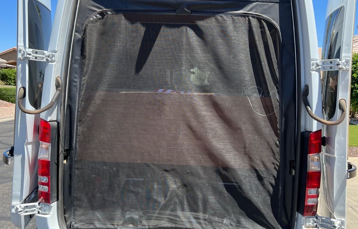 Screendoor to keep the outside where it belongs.