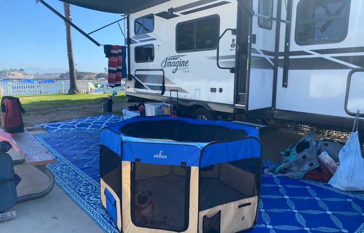 Portable dog run available to rent! Camping rug included in the rental.