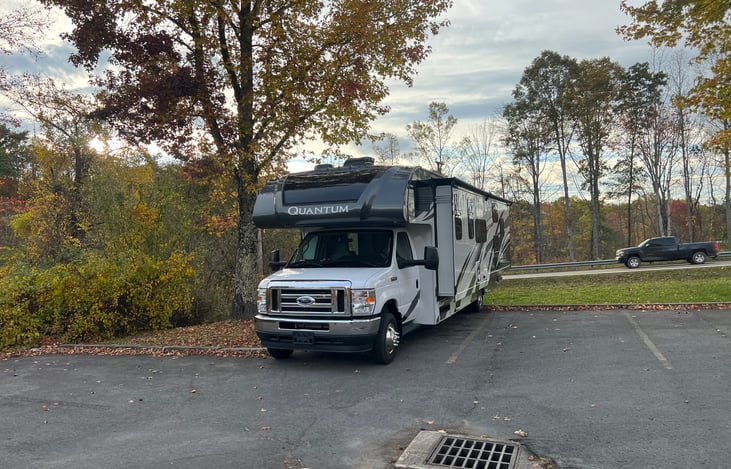 31' long but can fit well into parking spaces picked correctly