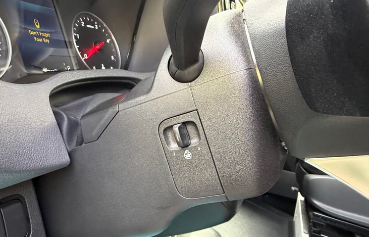 Heated Steering wheel. Manual adjusting steering wheel knob below.