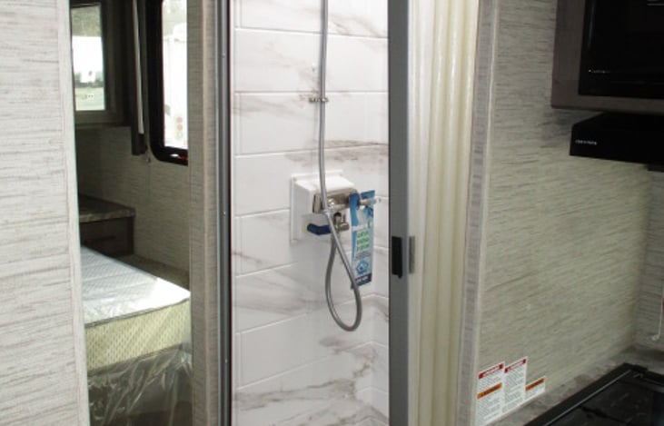 shower opposite the bathroom area