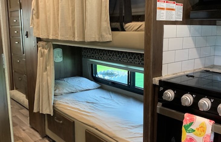 bunk beds that can have windows open