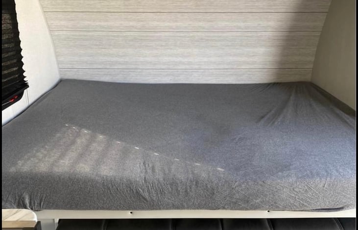 Queen sized Murphy bed, which folds up into a couch.