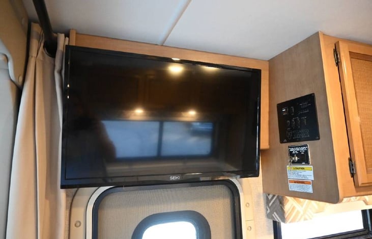 Three TVs including one outdoor TV