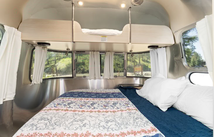 All bed linens included!  There is a bunk above the queen bed.