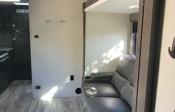 with the slide out, there is plenty of space in front of the couch