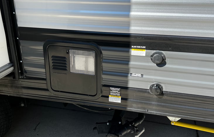 Hot water tank, water hookup, and tank flush.