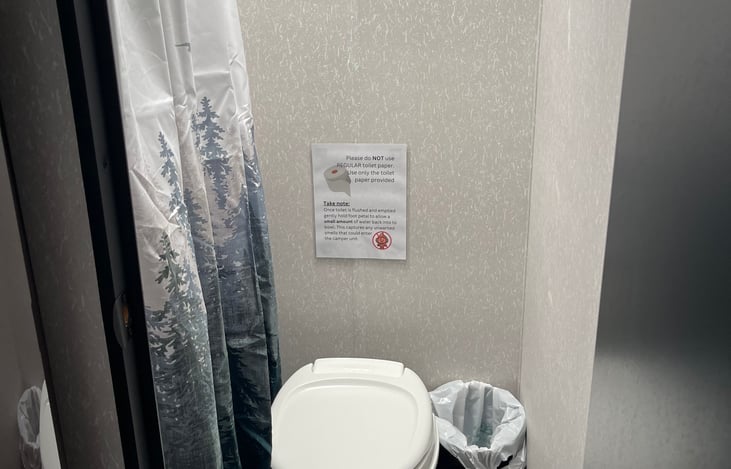 Toilet and indoor shower, collapsible garbage can