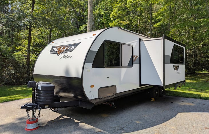 Step into comfort with this 2024 Wildwood X-Lite 240BHXL. This family-friendly bunkhouse camper comfortably sleeps up to 8 with a King-size Versa-Tilt bed, large bunks, modern interior, and more.