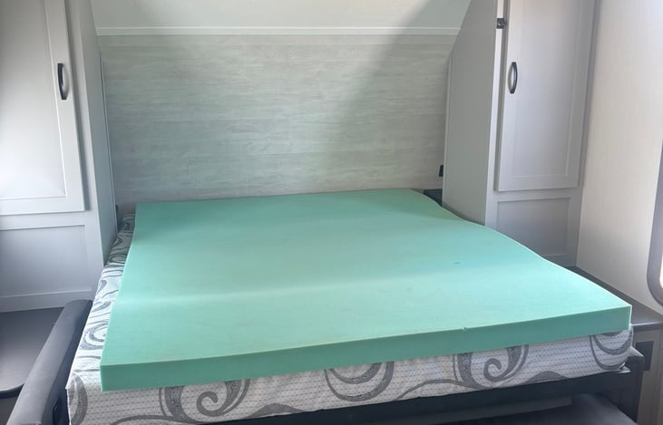 Murphy bed with foam topper.
