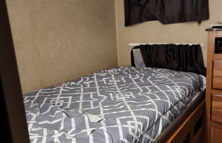 Single bed inside the bunk house