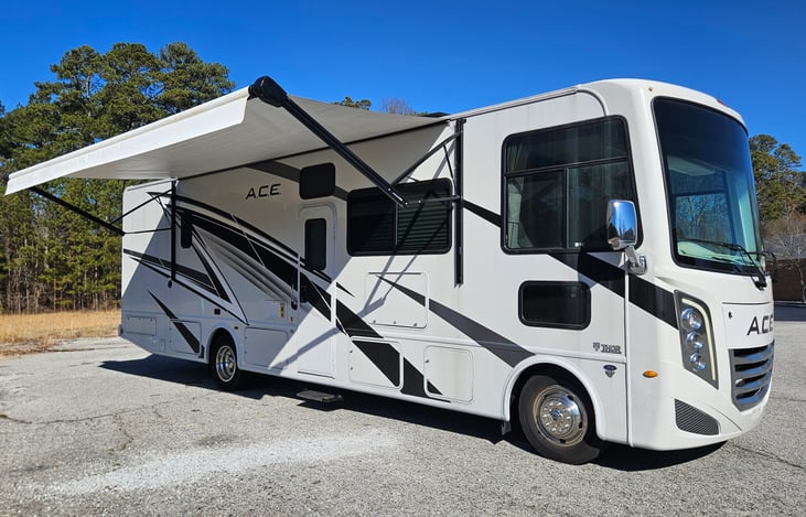 Relax in style under the extended awning of the 2024 Thor A.C.E. 32B! Perfect for outdoor gatherings, offering shade and comfort wherever your adventure takes you.