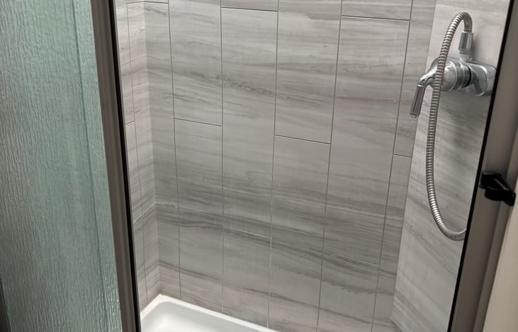 Shower area w/glass sliding door!