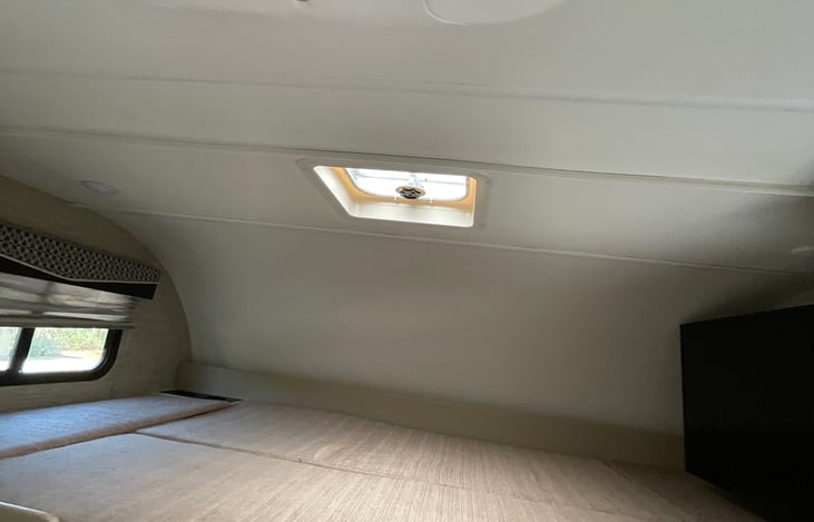 Upper bunk sleeps two adults. Bedding included.